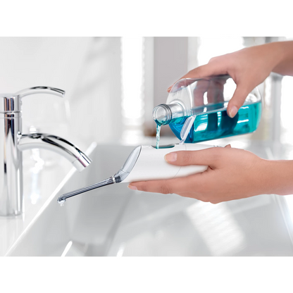 Philips Air Floss - HX8331/01 - With 2 Flossing Modes And A Slim Angled Nozzle, It Reaches Areas Traditional Floss Can't