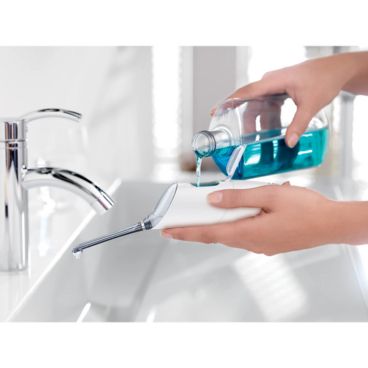 Philips Air Floss - HX8331/01 - With 2 Flossing Modes And A Slim Angled Nozzle, It Reaches Areas Traditional Floss Can't